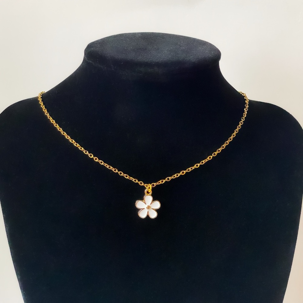 Gold Necklace with White Flower Pendant